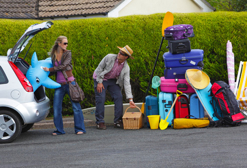 getty_rm_photo_of_couple_unpacking_automobile